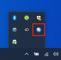 Close-up of the Windows taskbar showing a small blue circle icon with a lowercase white "b" inside, used to open the Self Service portal.