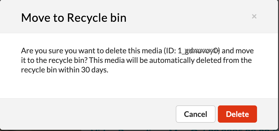 A dialog box titled "Move to Recycle bin" asks for confirmation to delete a media item with a specific ID (obscured in the screenshot) and states that the media will be automatically deleted from the recycle bin within 30 days. It presents two buttons: "Cancel" and "Delete".