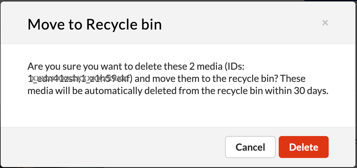A dialog box titled "Move to Recycle bin" asks for confirmation to delete media items (listed by ids, which are obscured) and move them to the recycle bin, noting they will be automatically deleted within 30 days. The options presented are "Cancel" and "Delete" buttons.